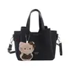 Bolso cruzado de un solo hombro casual retro a la moda con una textura simple, bolso de nuevo estilo para el verano de 2026, bolso tipo cubo personalizado para mujer
