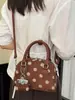 Bolso Shuai Mi Jia elegante y moderno de nicho de lunares para mujer, nuevo bolso cruzado de otoño 2026 para el trabajo, bolso de mano, bolso almohada
