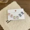 Joyería de Diamantes con Flor de Ciruelo Brillante de Nuevo Estilo, Diseño Geométrico Irregular Simple, Sensación de Lujo Ligero y Gama Alta, Múltiples Estilos de Aretes