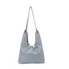 Bolso de hombro versátil de gran capacidad con textura, estilo coreano, de doble cara, para bandolera y tote, 2026