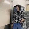Comercio Exterior Estilo Hong Kong Verano 2025 Nuevo Camisa Floral de Manga Corta Suelta para Hombre Camisa Floral Hawaiana de Playa para Hombre