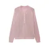 Ins transfronterizo Europa 2026 nuevo elegante temperamento Amazon venta al por mayor de ropa para mujer cuello en V color liso manga larga tejido