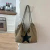 Bolsa de ombro grande estilo ins coreano com formato de estrela para mulheres, casual e versátil, adequada para o trabalho e o trajeto