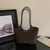 Bolsa de mão com estampa de leopardo estilo coreano para trabalho e deslocamento, novo modelo outono 2026, alto valor estético, bolsa tote de ombro única e de nicho