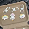 Chaveiro fofo de desenho animado de foca adorável, bolinho de pudim, charme feminino para mochilas de estudantes, presente para melhores amigos