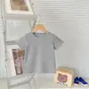 Camiseta de Manga Corta Básica Versátil de Color Sólido para Niños Verano 2026 Camiseta de Cuello Redondo para Niños y Niñas Ropa