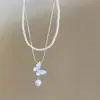 Collar con borla de mariposa y perla degradada de cristal de hielo para mujer, cadena de clavícula exquisita de alta gama de verano, cadena de cuello con especias frescas y dulces.