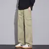 Calça de trabalho masculina de algodão estilo americano para o outono, apresentando um design retrô, minimalista e sofisticado com múltiplos bolsos e corte reto para um visual casual.