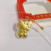 Colgante de Teléfono Dorado Llavero Gato de la Suerte Compañía de Oro Puro 999 Regalos Culturales Creativos Mayoreo