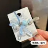 Pinza para el pelo con lazo de encaje vintage francés para niñas, pinza lateral azul perla de alta gama de nicho para mechones sueltos, accesorio para el cabello