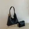 Bolso de hombro nuevo para mujer 2026 transfronterizo, bolso retro para el día a día, bolso grande de capacidad para llevar debajo del brazo, bolso tote para madre e hija