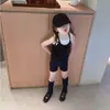 Conjunto de verano para niña, estilo fino, nuevo modelo 2026, súper estiloso y a la moda, shorts negros y top tipo tank top negro de dos piezas falso