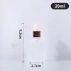 Botellas dispensadoras de esencia cosmética líquida portátiles al por mayor del fabricante, Botellas vacías, Botellas gotero de vidrio ámbar transparente para aceites esenciales