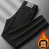 Jeans blancos de alta gama Lyocell para hombre, tres pruebas, nuevos jeans ajustados skinny elásticos para otoño e invierno con forro polar y diseño engrosado