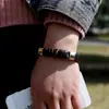 Pulsera unisex estilo europeo y americano pulsera tejida de cuero genuino pulsera de piel de vaca vintage pulsera de AliExpress de venta caliente