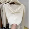 Otoño e invierno estilo coreano dulce y suave cuello en V volantes de encaje terciopelo Andy tejido cárdigan suéter abrigo