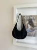 Bolso de mujer transfronterizo 2026 nuevo bolso de gamuza, bolso de axila de mujer de alta gama vintage, bolso de béisbol, bolso cruzado, moderno