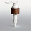Suministro Bomba de emulsión de grano de madera de 24 dientes fábrica transferencia de agua imitación grano de madera cabezal de bomba de plástico presión gel de ducha bomba de emulsión espiral