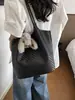 Bolso de hombro grande de verano 2026 para mujer, patrón tejido de nicho estilo coreano transfronterizo, elegante bolsa tote para ir al trabajo