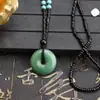 Actividad regalo pequeño Regalo puesto de collares collar de jade sintético al por mayor colgante de hebilla de paz cadena para suéter colgante de jade colgante