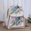 Mochila de algodón y lino bordada con hilo de oro de estilo étnico, una mochila de lona de estilo chino tradicional y literario, adecuada para estudiantes, ligera e ideal para viajar
