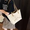 Bolsa de Lona Casual Transfronteiriça para Pendular Feminina Grande Capacidade 2025 Nova Bolsa de Ombro Simples Estilo Japonês Estilo Roupa de Trabalho Bolsa de Axila