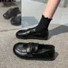Zapatos perezosos de un paso zapatos pequeños de cuero negro 2026 Otoño zapatos planos de un solo color zapatos de mujer mocasines estilo británico retro mujeres