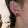 Diseño único de nicho Aretes de nudo concéntrico retro francés aretes de temperamento de alta gama de lujo ligero aretes de otoño e invierno para mujer