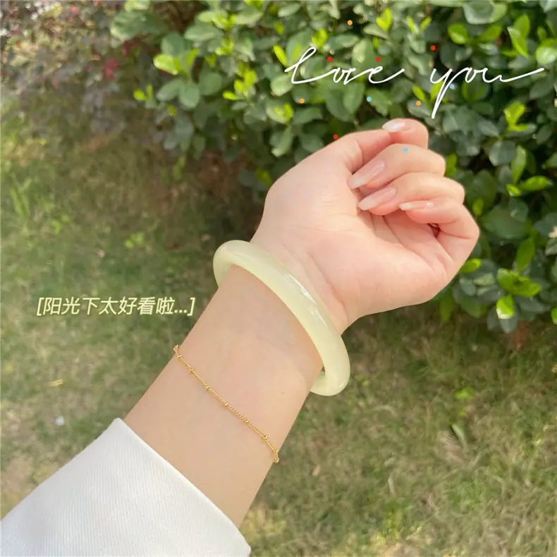 复制_小红书仿玉同款叮当圆条粗款玻璃一步响叮当.jpg