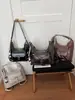 Bolso pequeño cuadrado muy elegante para el día a día, nuevo de principios de otoño 2026 versión coreana ins bolso cruzado casual, bolso de hombro de nicho y único
