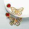 Pendientes colgantes de mariposa con diamantes de imitación de colores de moda transfronteriza entre Europa y Estados Unidos, pendientes de alfiler de plata S925 de temperamento simple retro