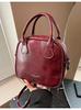 Bolso de mano pequeño vintage de otoño e invierno 2024, bolso de mano sencillo de color liso, bolso de hombro combinable, bolso cruzado.