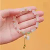 Novo Estilo Chinês Natural Ouro Seda Jade Pulseira Tiandongling Jade Fio de Seda Saco de Dinheiro Círculo Único Alta Qualidade Gobi Jade Corda de Mão Contas de Buda