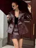 Moda Otoño e Invierno Elegante de Gama Alta Color Sólido Solapa Doble Botonadura Chaqueta de Cuero Traje de Falda Corta Moda Transfronteriza 2025