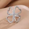 Anillo de trébol nuevo estilo coreano hueco anillo de corazón de melocotón de lujo ligero chapado en platino Mori pulsera ins