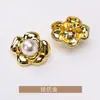 Botón de flor metálico estilo británico de alta gama estilo Chanel fábrica directa abrigo galvanizado sellado con esmalte botón de costura a mano con pie