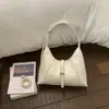 Bolsa de Braço 2026 Novo Estilo Simples para o Dia a Dia Bolsa Bolinho Fashion Versátil Bolsa de Mão de Alto Padrão Nicho Bolsa de Ombro para Mulheres