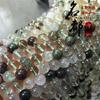 Cuentas sueltas de cristal Mingdu, cuentas redondas de fantasma verde natural, accesorios de joyería para bricolaje, productos semiacabados de fantasma de cornucopia al por mayor