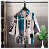 Camisa de manga tres cuartos para jóvenes, verano 2025, nueva camisa estampada de manga corta, holgada, transpirable, marca de moda, tops para hombre