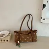 Bolso de Albóndiga Shuai Mi Jia, de nicho, elegante y con estilo, modelo nuevo de verano 2026, bolso de hombro de color sólido de moda, bolso de trompa para ir al trabajo