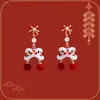 Pendientes de felpa de danza del león de moda para mujer, nuevo estilo 2026, aspecto de alta gama, perfectos para invierno.