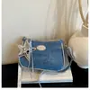 Bolso de alta calidad para debajo del brazo para mujer, nueva moda 2026, popular este año, bolso de cadena, bolso cruzado único de nicho de Instagram