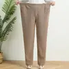 Pantalones extra grandes para mujeres de mediana edad y mayores, pantalones de estilo western para madre, moda de alta gama, pantalones rectos, nuevos para otoño e invierno, pantalones cálidos con temperamento