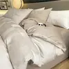 Juego de cuatro piezas de jacquard de algodón de fibra larga de lujo ligero de alta gama, sábana de algodón puro, funda de edredón, sábana bajera, ropa de cama para hotel y casa de huéspedes