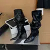 Botas elegantes y de estilo maduro con punta de pico plisada y tacón de bloque para mujer, nuevo modelo otoño e invierno 2026, botas de montar altas y estilosas con tacón de cuña