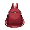 Estilo Novo 2025 Transfronteiriço Moda Feminina Tecido Oxford Viagem de Alta Qualidade Mochila Pequena de PU Versátil Bolsa Escolar Bolsa de Ombro Duplo