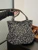 Bolso de hombro de gran capacidad con estampado de leopardo, moderno, para mujer, nuevo, sencillo, bolso de mano, bolso de compras grande, bolso para caminar que combina con todo.