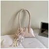 Bolso Único con Textura Bolso Tipo Bowling 2026 Modelo Nuevo Simple Lunares Bolso de Hombro para Viajes Diarios Bolso de Hombro Versátil