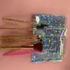 Set de siete brochas de maquillaje herramientas de belleza brocha para sombra de ojos brocha para rubor raspador de cejas cepillo para pestañas en espiral cepillo para cejas