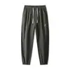 Pantalones casuales para hombre para otoño e invierno, corte holgado, versátiles, estilo deportivo, con puños elásticos